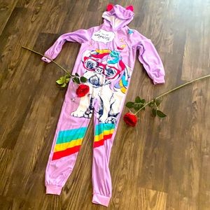 The color is a light purple with a unicorn design